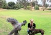 Helen Ganska and Betty the Boxer chat to a cockatoo at West Cape Howe in Mt Barker