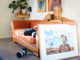 Nic Duncan with her photo of gold prospector Johnny Day, which was a finalist in the National Portrait Prize. © Serena Kirby